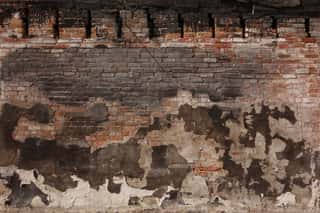 Burned Plaster And Brick Wall Wall Mural