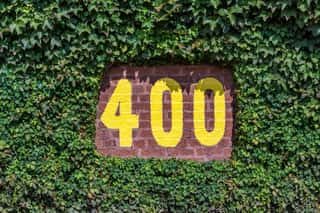 400 Feet Sign On The Outfield Wall Of Wrigley Field In Chicago, Illinois Wall Mural