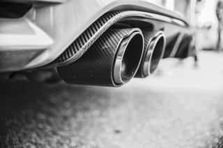 Double Exhaust Pipes Of A Modern Sports Car, Black And White Wall Mural