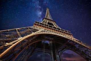 The Eiffel Tower At Night In Paris, France Wall Mural