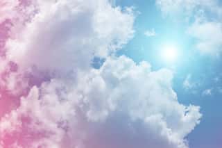 Sun And Cloud Background With A Pastel Colored
 Wall Mural