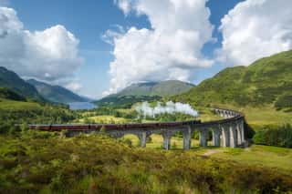Jacobite Steam Train (a K A  Hogwarts Express) Passes Glenfinnan Viaduct Wall Mural