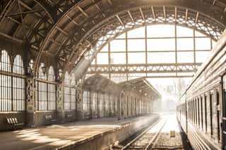 Train Station Indoor Sunset Sunrise In Sepia  Carriage And Platform With Construction Roof  Travel On Train On Railway Wall Mural