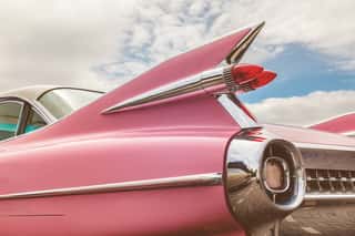 Rear End Of A Pink Classic Car   Wall Mural