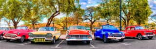 Colorful Group Of Classic Cars In Old Havana, An Iconic Sight In Cuba Wall Mural