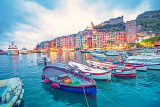 Mystic Landscape Of The Harbor With Colorful Houses And The Boats In Porto Venero, Italy, Liguria In The Evening In The Light Of Lanterns Wall Mural