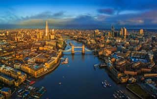 London, England - Panoramic Aerial Skyline View Of London Including Iconic Tower Bridge With Red Double-decker Bus, Tower Of London, Skyscrapers Of Bank District At Golden Hour Early In The Morning Wall Mural