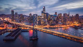 Aerial Cityscape View Of San Francisco And The Bay Bridge At Night Wall Mural
