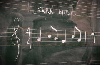 Random Music Notes Written With White Chalk On A Blackboard  Learn Or Teach Music Concepts  Wall Mural
