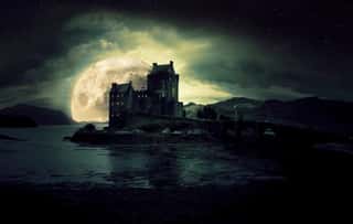 Haunted Mystic Eerie Eilean Donan Castle In Scotland Wall Mural
