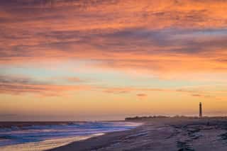 Cape May NJ Lighthouse And Atlantic Ocean At Sunset In Springtime  Wall Mural