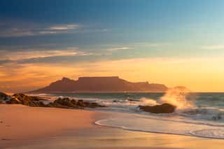 Scenic View Of Table Mountain Cape Town South Africa From Blouberg At Golden Sunset With Splashing Waves Wall Mural