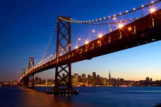 San Francisco Skyline And Bay Bridge At Sunset, California, USA Wall Mural