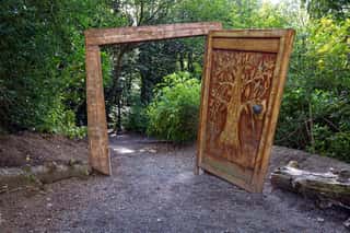 The Wardrobe Door In The Beginning Of Narnia Trail In Kilbroney Park, Rostrevor, Northern Ireland Wall Mural