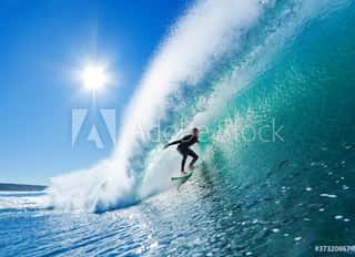 Surfer On Blue Ocean Wave Blue Sky Wall Mural