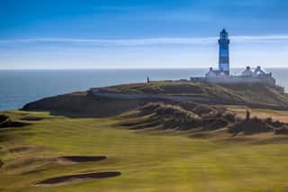 The Lighthouse Overlooking The Old Head Of Kinsale Golf Course In County Cork Ireland Wall Mural