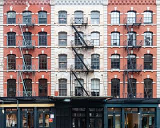 Exterior View Of Historic Brick Buildings Along Duane Street In The Tribeca Neighborhood Of New York City Wall Mural