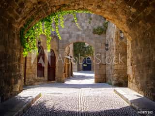Medieval Arched Street In The Old Town Of Rhodes, Greece Wall Mural