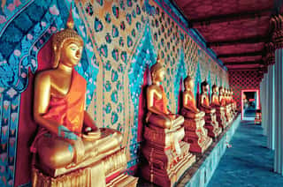 Golden Statues Of Buddha In Wat Arun Temple, Bangkok Wall Mural