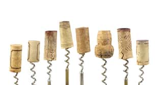 Collection Of Wine Corks, Isolated On White Background Wall Mural