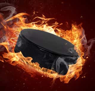 Hot Hockey Puck In Fires Flame Wall Mural