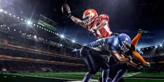 American Football Player In Action At Game Time Wall Mural