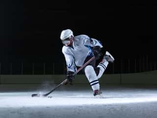 Ice Hockey Player In Action Wall Mural