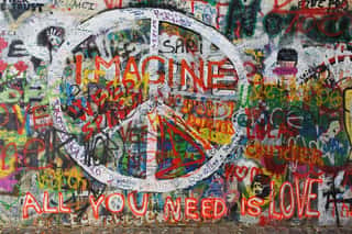 Colorful Peace Graffiti On Wall Wall Mural