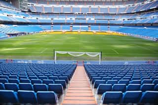 Empty Football Stadium With Blue Seats Wall Mural