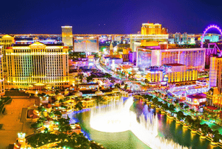  View Of The Las Vegas Boulevard At Night With Lots Of Hotels And Casinos In Las Vegas  Wall Mural
