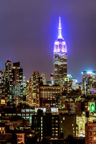 Empire State Building Glows Blue Wall Mural