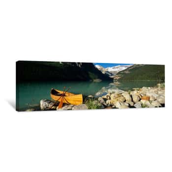 Image of Canoe At The Lakeside, Lake Louise, Banff National Park, Alberta, Canada Canvas Print