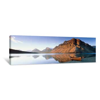 Image of Canoe At The Lakeside, Bow Lake, Banff National Park, Alberta, Canada Canvas Print