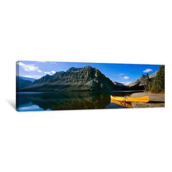 Image of Canoe At The Lakeside, Bow Lake, Banff National Park, Alberta Canvas Print