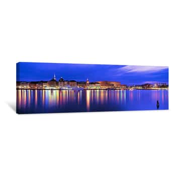 Image of Buildings At The Waterfront Lit Up At Dusk, Stockholm, Sweden Canvas Print
