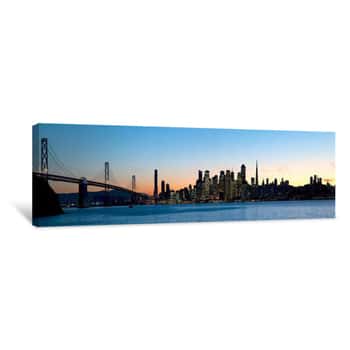 Image of City Skyline And A Bridge At Dusk, Bay Bridge, San Francisco, California, USA Canvas Print