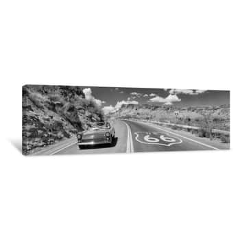 Image of Vintage Car Moving On The Road, Route 66, Arizona, USA Canvas Print