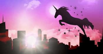 Image of Unicorn Silhouette Jumping Over City Canvas Print