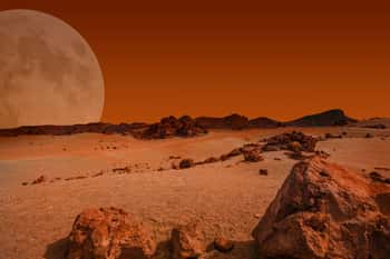 Image of Red Planet With Arid Landscape, Rocky Hills And Mountains, And A Giant Mars-like Moon At The Horizon, For Space Exploration And Science Fiction Backgrounds  Elements Of This Image Furnished By NASA  Canvas Print