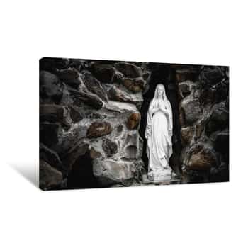 Image of Statue Under the Cliff Canvas Print