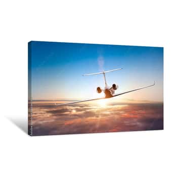 Image of Private Jet Plane Flying Above Clouds Canvas Print