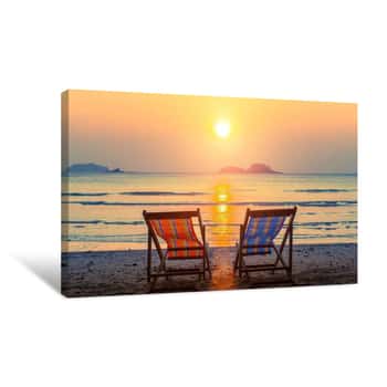 Image of Pair Of Beach Loungers On The Deserted Beach At Sunset  Canvas Print