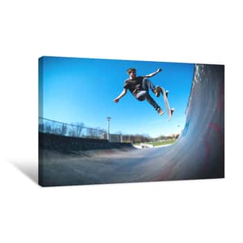 Image of Skateboarder Doing Ollie On Ramp Canvas Print