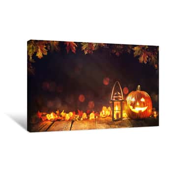 Image of Halloween Pumpkin With Lantern On Wooden Canvas Print