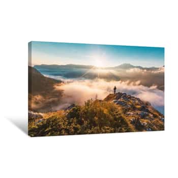 Image of Successful Hiker Enjoying At Top Of Mountain Above Clouds Canvas Print