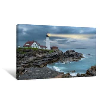 Image of Lighthouse Beam Light In Stormy Clouds  Portland Head Light, Maine, USA  Canvas Print