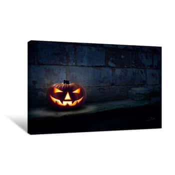 Image of Halloween Jack O Lantern With Light Shining Down On It Canvas Print