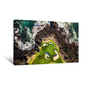 Image of Breathtaking Drone View Of A Golf Course Next To The Ocean At Low Tide With Waves Hitting The Rocks In Pebble Beach Canvas Print