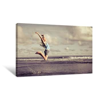 Image of Girl Jumping on the Beach Canvas Print