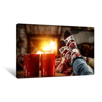 Image of Woman Legs With Christmas Socks And Fireplace In Home Interior Canvas Print